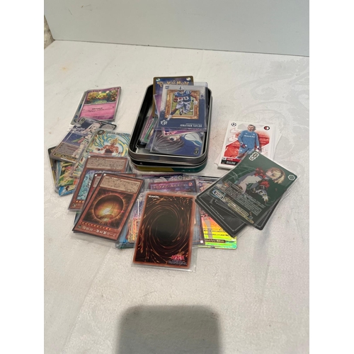 268 - TIN POKEMON CARDS INC FOOTBALL ETC