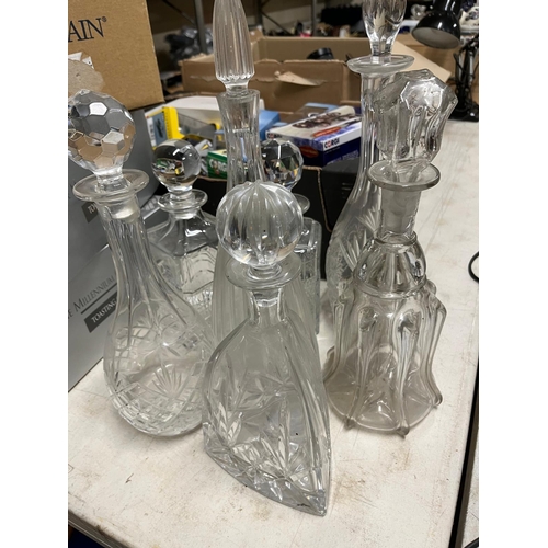 114 - 7 CUT GLASS DECANTERS