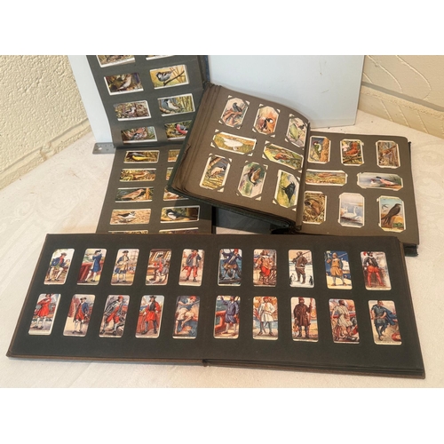 318 - 3 CIGARETTE CARD ALBUMS