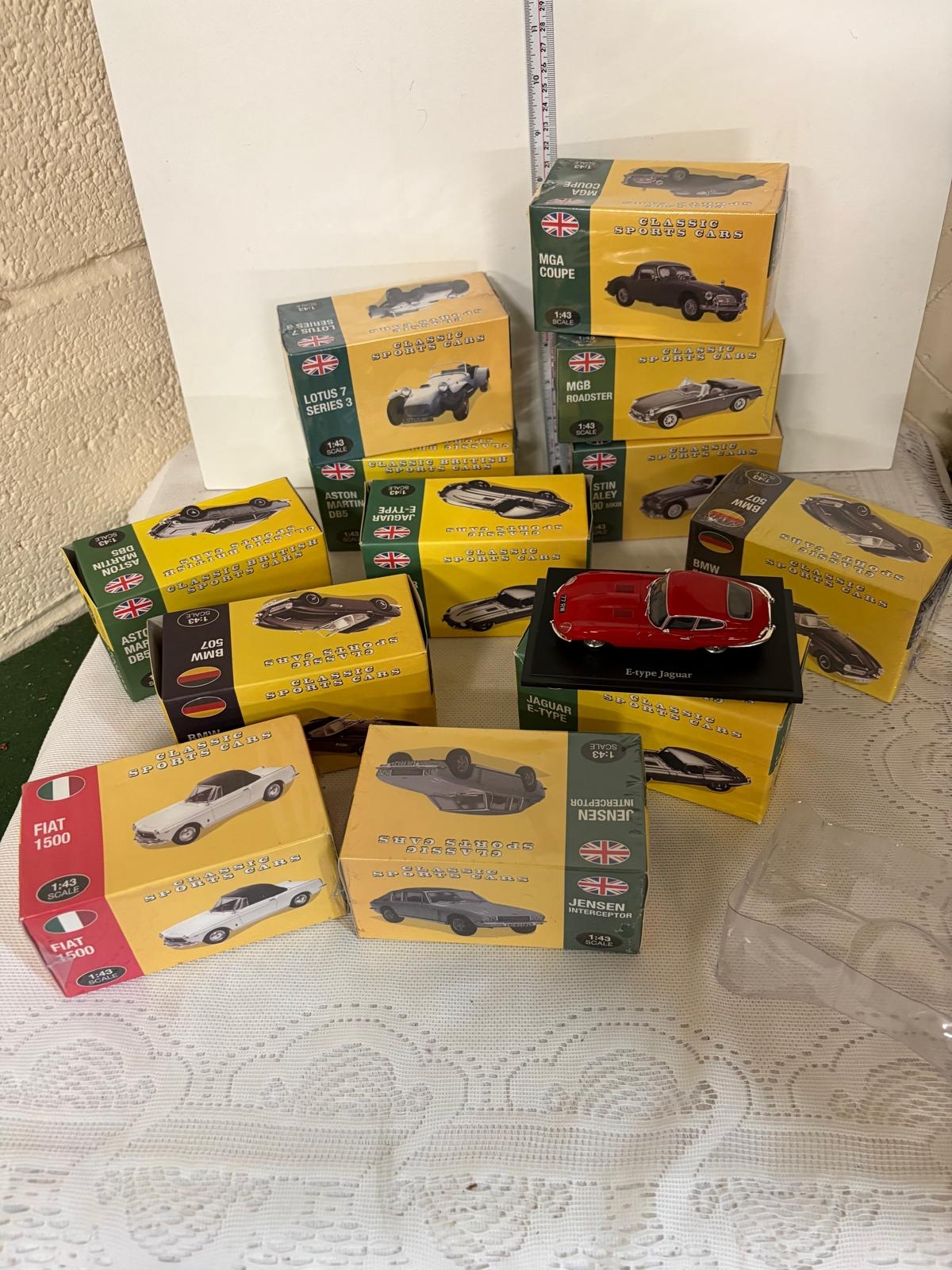 12 BOXED MODEL CARS MOST UNOPENED