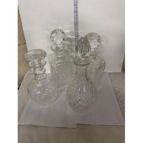 5 - 4 CUT GLASS DECANTERS