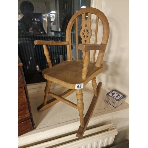 59 - Nice Vintage Pine Wheelback Child's Rocking Chair