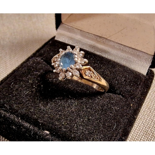 242 - 9ct Gold Blue Stone Dress Ring