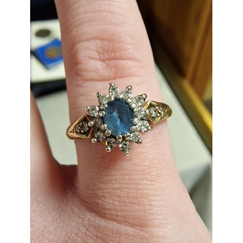 242 - 9ct Gold Blue Stone Dress Ring