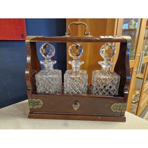 17 - 3-Decanter Tantalus with single drawer + key in oak with brass embellishments dimensions L14