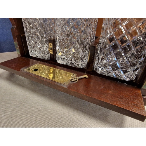 17 - 3-Decanter Tantalus with single drawer + key in oak with brass embellishments dimensions L14