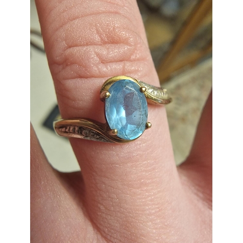 215 - 9ct Gold Blue Topaz and Diamond Shouldered Serpentine Dress Ring, size S