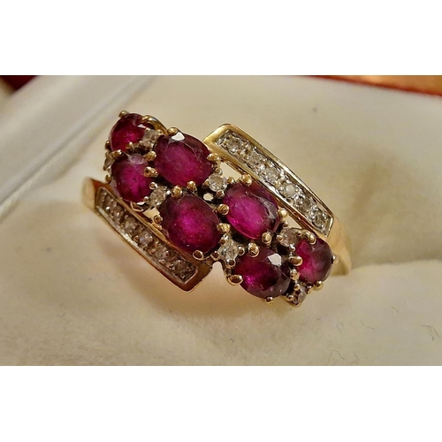 233 - 9ct Gold Multi-Stone Ruby and Diamond Crossover Dress Ring, size U