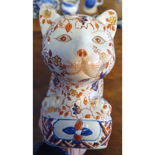 263 - Highly decorated ceramic cat, with Chinese marking to base, dimensions L30cm x W10cm x H10cm approx.