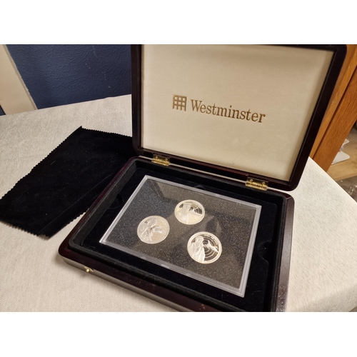 94 - Cased Trio of Westminster Collection Silver Royal Navy/Army/RAF Coins