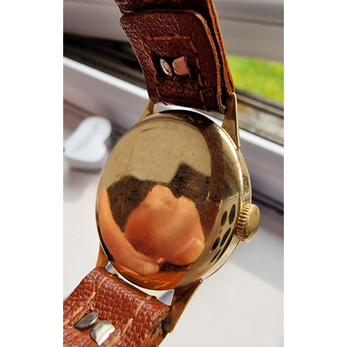 141 - 9ct Gold Smiths Astral Leather-Strapped Vintage Wrist Watch