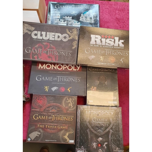 233a - Collection of Game of Thrones Board Games and Jigsaws inc Monopoly and Risk