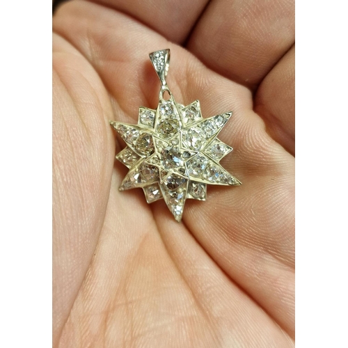 158 - 14ct White Gold & Diamond Tsar Starburst Pendant inc 2.5-3ct worth of diamonds