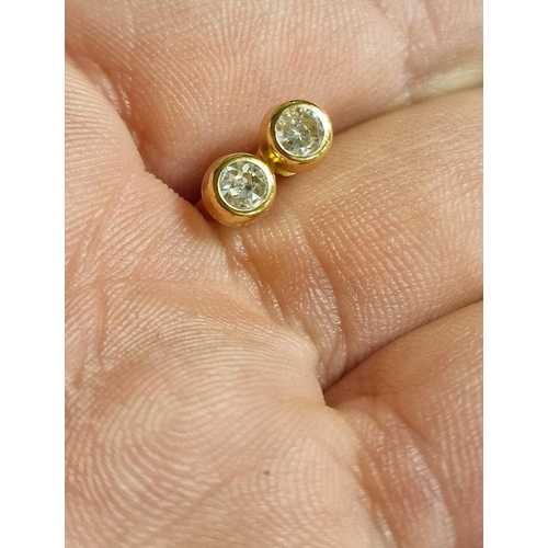 210 - Pair of 9ct Gold and Diamond Stud Earrings