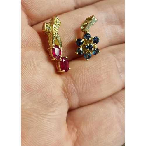 218 - Pair of 9ct Pendants - one Ruby and the other Tanzanite - 2.8g