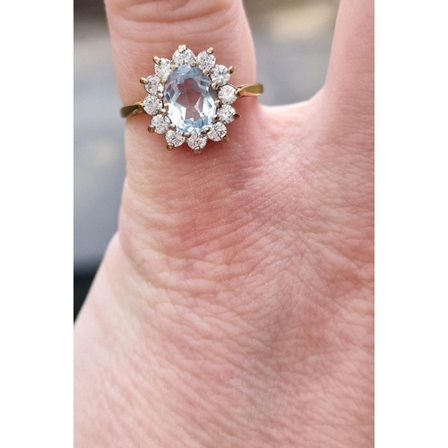 219i - 9ct Gold Blue Topaz and CZ Cluster Ring - size O