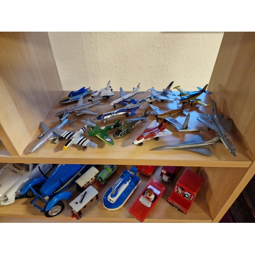 106 - Collection of 22 diecast airplanes and approx 45 mostly diecast vehicles (incl. Matchbox, Corgi)