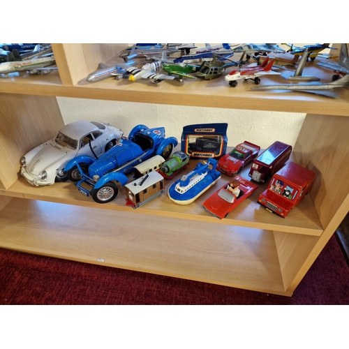 106 - Collection of 22 diecast airplanes and approx 45 mostly diecast vehicles (incl. Matchbox, Corgi)