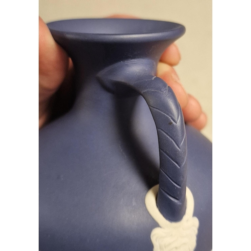 12 - Twin Handled Wedgwood Dark Blue Portland Jasperware Vase - 15cm high - Proceeds to Overgate Hospice