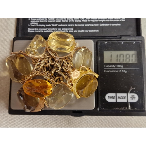 136 - Antique 9ct Gold and Large Citrine Stone Charm Bracelet - 111g, each stone individually bought durin... 