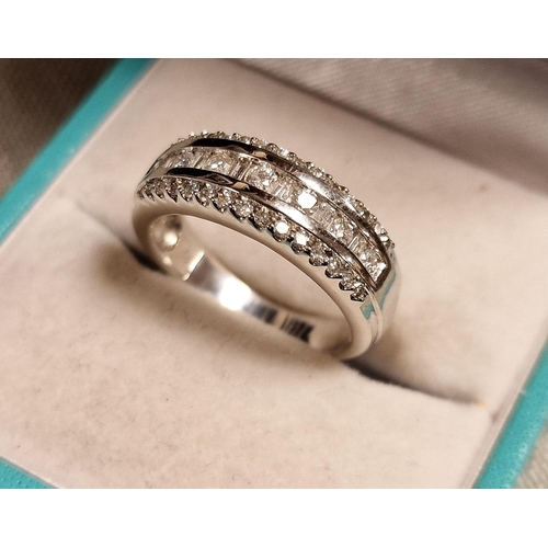 142 - 18ct White Gold and Diamond Triple Row Eternity Ring - size M+0.5, 5.6g