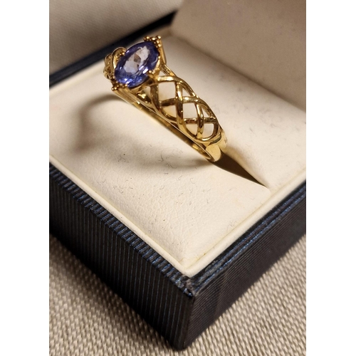 176 - 9ct Gold and Tanzanite Dress Ring, size R+0.5, 2.9g