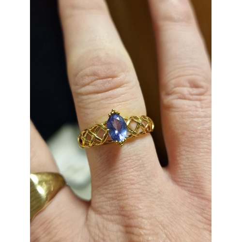 176 - 9ct Gold and Tanzanite Dress Ring, size R+0.5, 2.9g