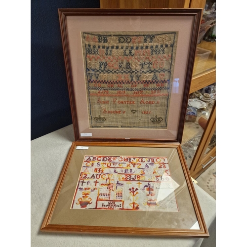 39 - Pair of Framed Samplers dated August 1881 and August 1925 - larger frame 37cm x 34.5cm