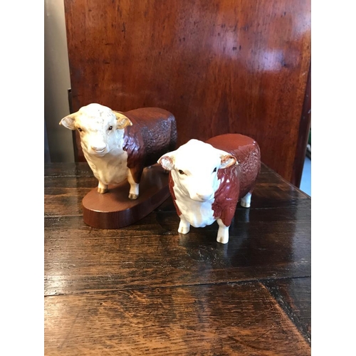 69i - Pair of Beswick Hereford Bull Figures - only slight AF on its ear