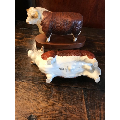 69i - Pair of Beswick Hereford Bull Figures - only slight AF on its ear