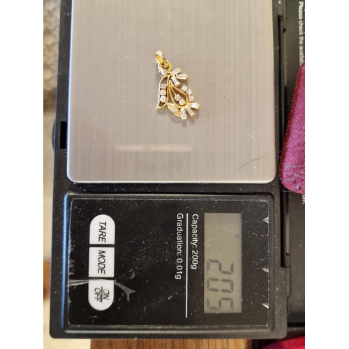 211 - 14ct Gold and Multi-Diamond Pendant, 2.05g