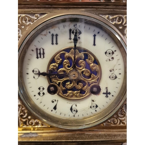 37e - Very Large Antique Brass Big Ben Mantel Clock, face features an Art-Nouveau style and indistinctly d... 