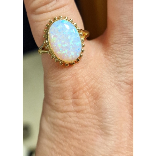 255 - 9ct Gold Large Opal Stoned Dress Ring, size O, 2.85g