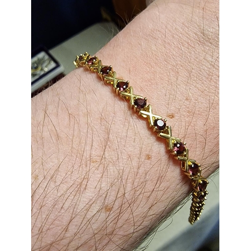 260 - 9ct Gold and Garnet Bracelet, 6.5g