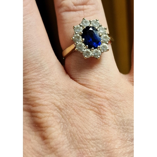 265 - 9ct Gold and Tanzanite Princess Diana Style Dress Ring, size Q, 3.8g