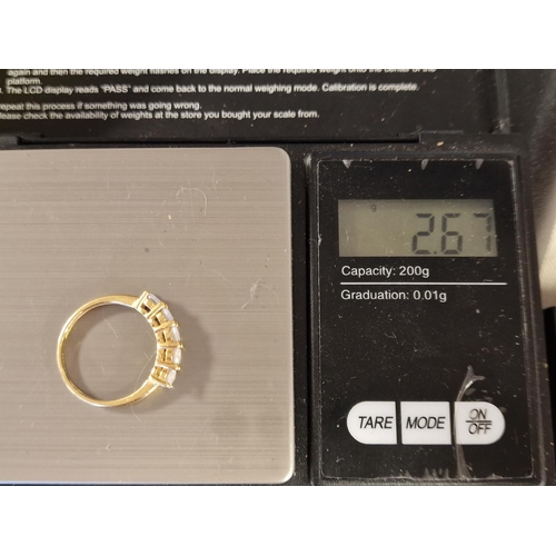 287 - 10ct Gold & Diamante Half Eternity Ring, 2.7g and size P