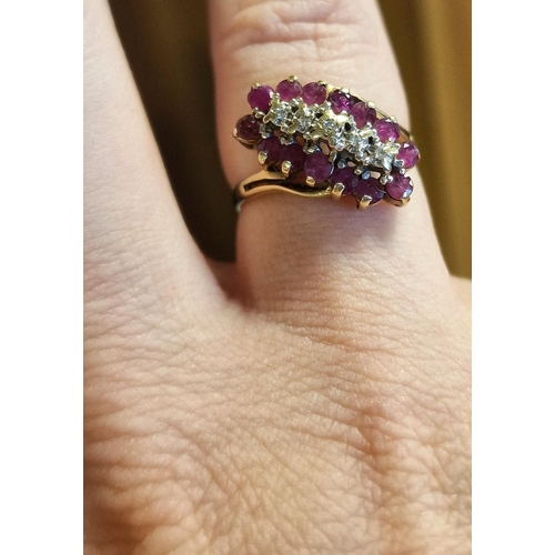 140 - Large 9ct Gold, Ruby & Diamond Cluster Ring 2.3g and size O+0.5