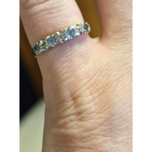 146 - 9ct Gold, Blue Topaz and Diamond Eternity Ring, size O