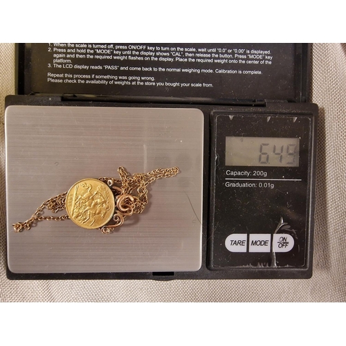 82i - 1915 22ct Gold Half Sovereign Coin inc a 9ct Chain - combined weight 6.5g