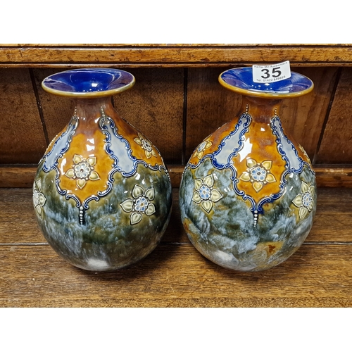 35 - Pair of Royal Doulton Lambeth Art Nouveau Vases - marked 6457 to base - 23cm high