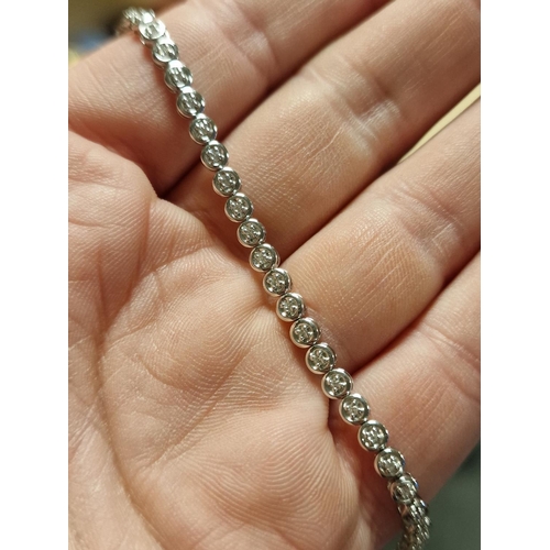 143 - 18ct White Gold & Diamond Tennis Bracelet - 7.8g total