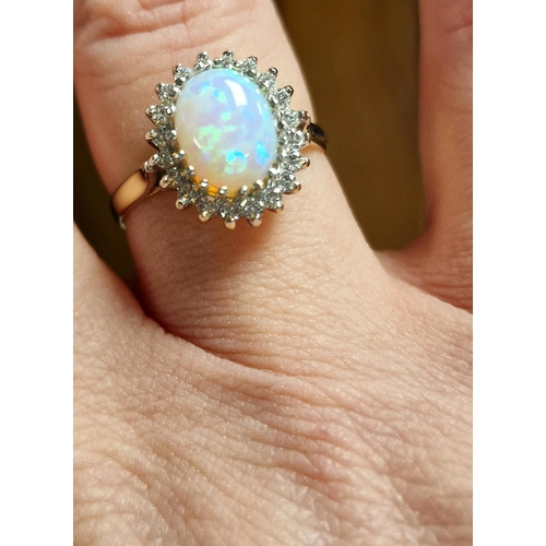 163 - 9ct Gold and Opal Dress Ring, size P & 2.7g