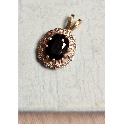 179 - 9ct Gold, Sapphire & Diamond Pendant