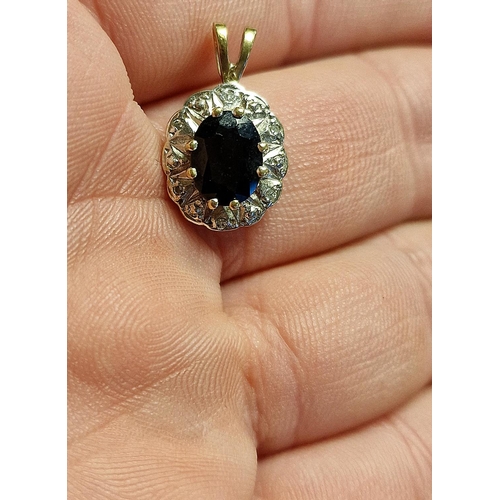 179 - 9ct Gold, Sapphire & Diamond Pendant