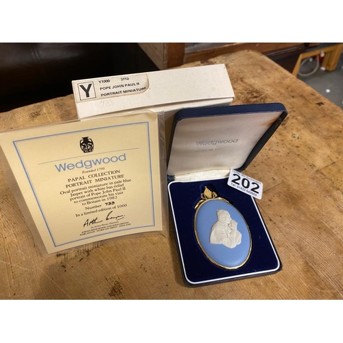 202 - Boxed Wedgwood Papal Collection Oval Portrait Miniature Approx 9cm x 5.5cm. Pale blue Jasperware wit... 