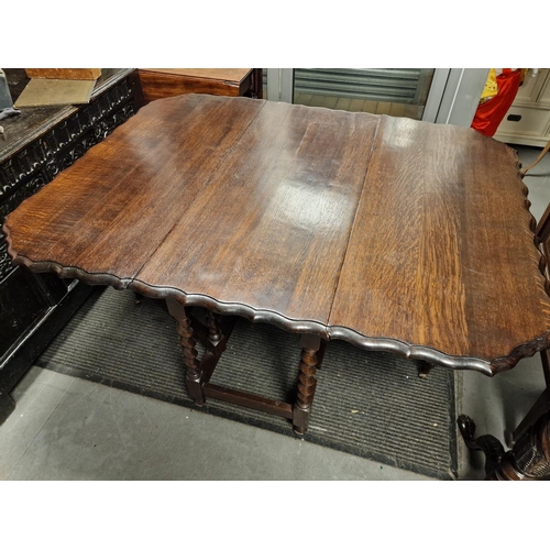 304 - 1930's Oak Drop Leaf Table w/fluted edges and barley Twist Legs - 104cm across by 72cm high