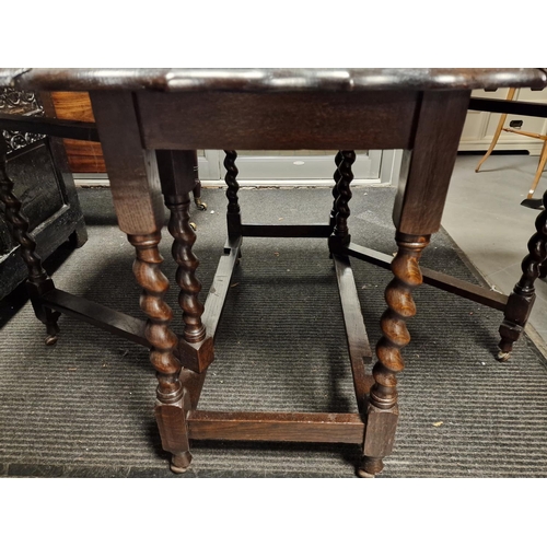 304 - 1930's Oak Drop Leaf Table w/fluted edges and barley Twist Legs - 104cm across by 72cm high