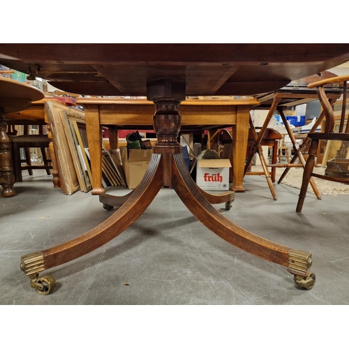 91 - Antique Regency Period Light Mahogany Tilt-top Table w/Urn carved pedestal + banded legs