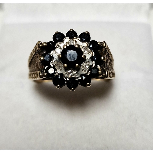 103 - 9ct Gold, Sapphire & Diamond Cluster Ring. Size K and weighs 2.9g