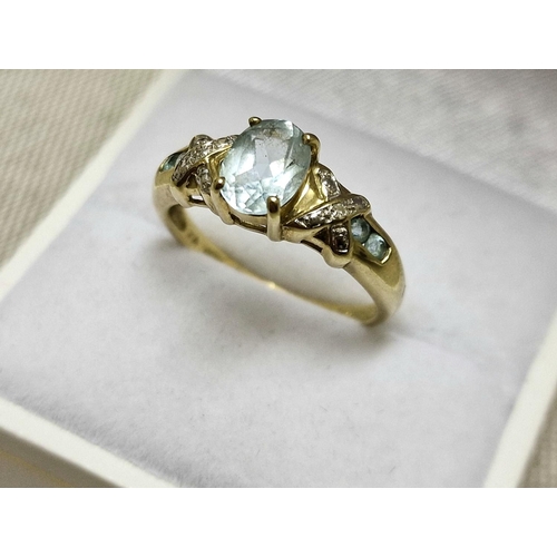 108 - 9ct Gold, Blue Topaz and Diamond Dress Ring, size Q & 2.9g